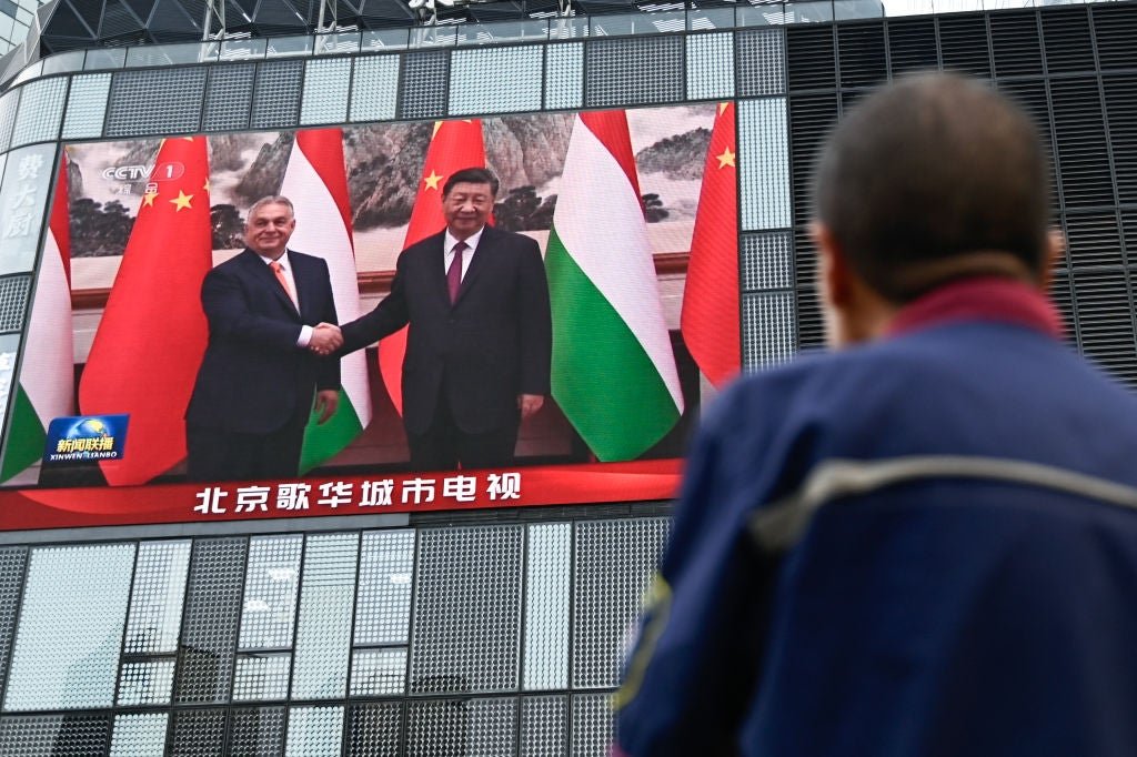 China hosts Hungary leader and announces joint exercises with Belarus